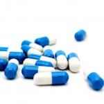 Blue & white capsules in blister strips at HimPharm